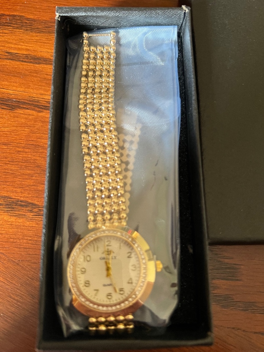 New Grealy ladies gold toned watch